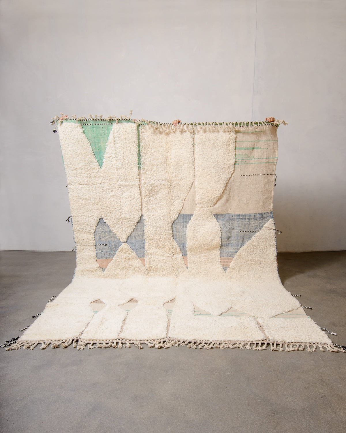 Modern, designer, handcrafted Berber rug from Morocco. Beniourain carpet with beautiful colours and patterns and fluffy wool texture.